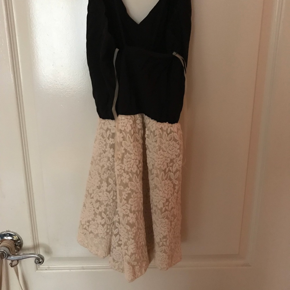 NWT Black and Cream Romper